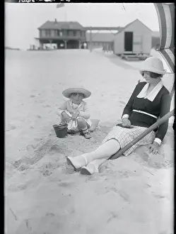 Girl Playing in the Sand