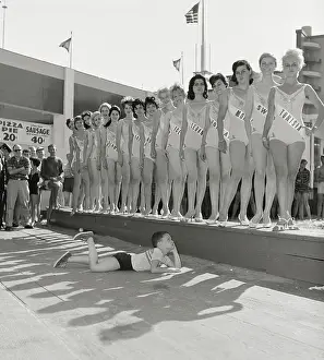 Girl Posing near Beauty Contestants
