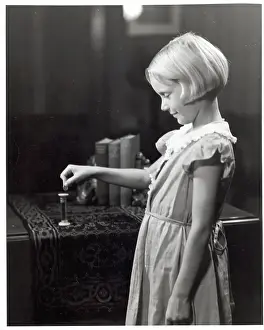 Responsibility Prints: Girl Putting Money Into Dime Bank