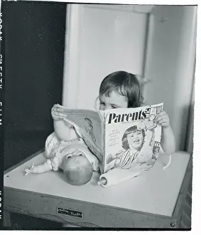 Girl Reading Parents Magazine