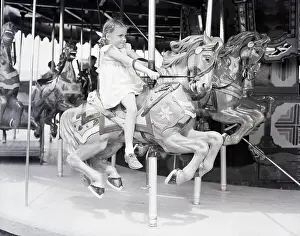 Carnival Prints: Girl Riding a Carousel