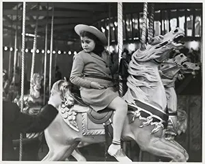 Amusement Park Prints: Girl Riding Carousel Horse