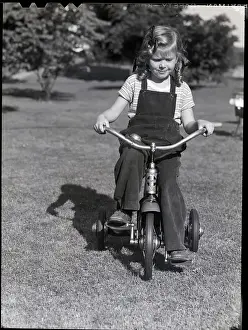Tricycle Prints: Girl Riding a Tricycle
