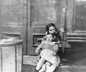 Poor Person Prints: Girl Sitting on Doorstep with Baby on Her Lap
