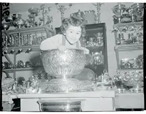 Girl Sitting Inside Large Antique Bowl