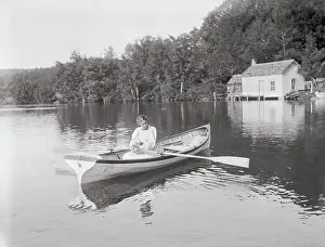 Girl Sitting in Rowboat