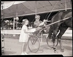 Girl Standing near James Cagney in Sulky
