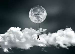 Images Dated 1st October 2015: Girl swinging on the moon