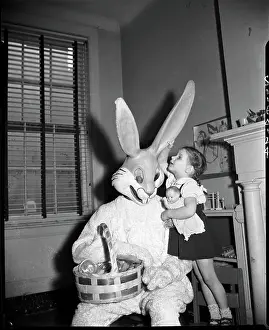 Girl Talking to Man in Rabbit Costume