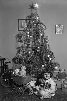 Stuffed Animal Prints: Girl and Toys Underneath Christmas Tree