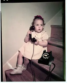 Girl Using the Telephone