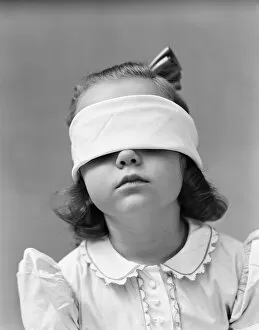 Images Dated 30th June 2008: Girl wearing blindfold, playing game