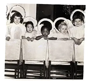Halo Prints: Girls in Angel Costumes on Chairs