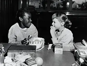 Girls Eating Lunch in School