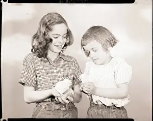 Girls Holding Easter Chickens