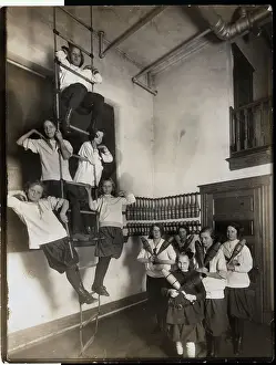 Gymnasium Prints: Girls Holding Indian Clubs In Gymnasium