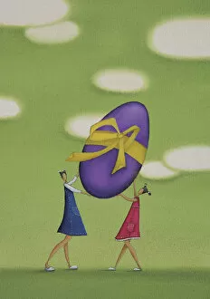 Girls Holding a Large Easter Egg
