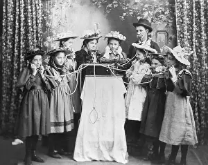Girls Listening to an Early Phonograph