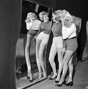 girls-looking-distorted-mirror