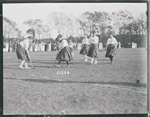 Prints of (Original Caption). Wellesley College Field Day and Halloween Party at Wellesley, Massachusetts, October 31, 1914. Hockey game Frozen Moments: A Journey Through Hockey History: Girls Playing Hockey