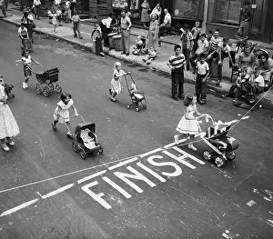 Derby Prints: Girls Pushing Toy Carriage Across Finish