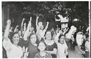Cheering Prints: Girls Raise Clenched Fists And Cheer