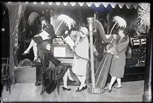 Nightclub Prints: Girls Stand Around Piano In Nightclub