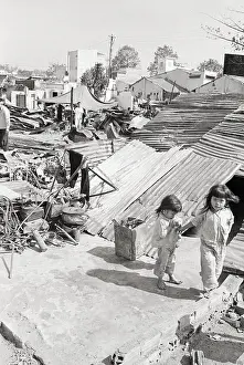 Rubble Prints: Girls Walking Amongst Rubble And Ruin