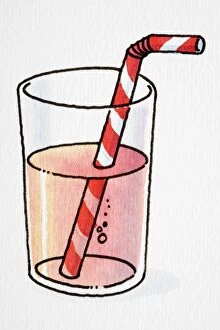 Glass tumbler of red juice with striped drinking straw