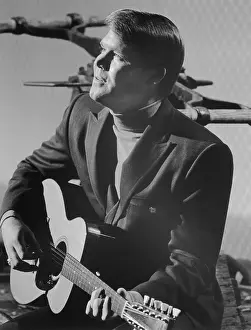 Glen Campbell Playing the Guitar