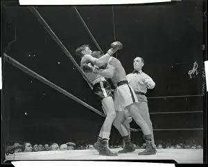 Glen Flanagan Pushing Ray Famechon into the Ropes