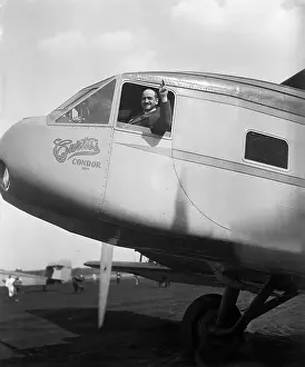 Curtiss Prints: Glenn Curtiss Waving from Curtiss Condor plane