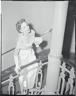 Gloria Case Walking Up Stairs