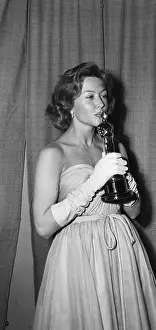 Receiving Prints: Gloria Grahame Receives Oscar Award