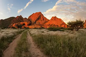 The Glowing Red Granite Rock Formations of Spitzkoppe at Sunset in the Erongo Region, Namibia
