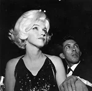 Prints of LOS ANGELES - MARCH 5: Actress Marilyn Monroe attends the Golden Globe Awards where she won the Henrietta award at the Beverly Hilton Hotel on March 5, 1962 in Los Angeles, California Marilyn Monroe: The Iconic Muse Prints: Golden Globes