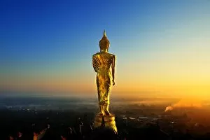 Images Dated 25th December 2010: The golden standing buddha statue in Nan, Thailand
