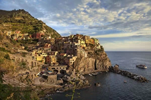 Images Dated 26th September 2015: Golden Sunset Over Manarola, Cinque Terre, Italy