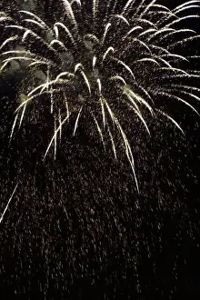 New Year Prints: Golden and white fireworks in the night sky, Laval, Quebec Province, Canada