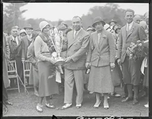 Peabody Prints: Golf Association President and Virginia Van Wie Holding Trophy