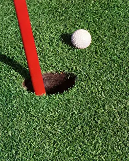 Golf Green, Flag Stick, Hole, and Ball