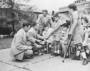 Disabled Prints: Golf Professionals Teaching Disabled Children