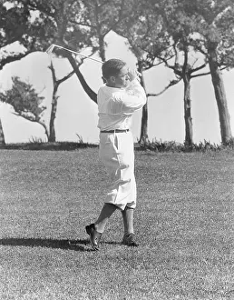Bermuda Prints: Golfer Bobby Jones Standing with Golf Club