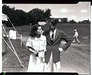 Golfer Byron Nelson Exchanging Smile with Wife