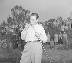 Golfer Harold McSpaden Kissing Putter