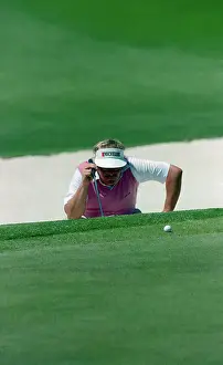 Golfer Roger Maltbie Angling His Par Putt
