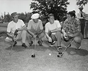 Golfers Posing with Their Golf Clubs