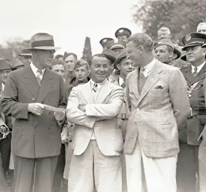 Checking Prints: Golfers Receiving Checks at Masters Tournament