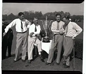 Golfers Standing Around PGA Trophy