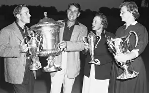 Golfers With Trophy